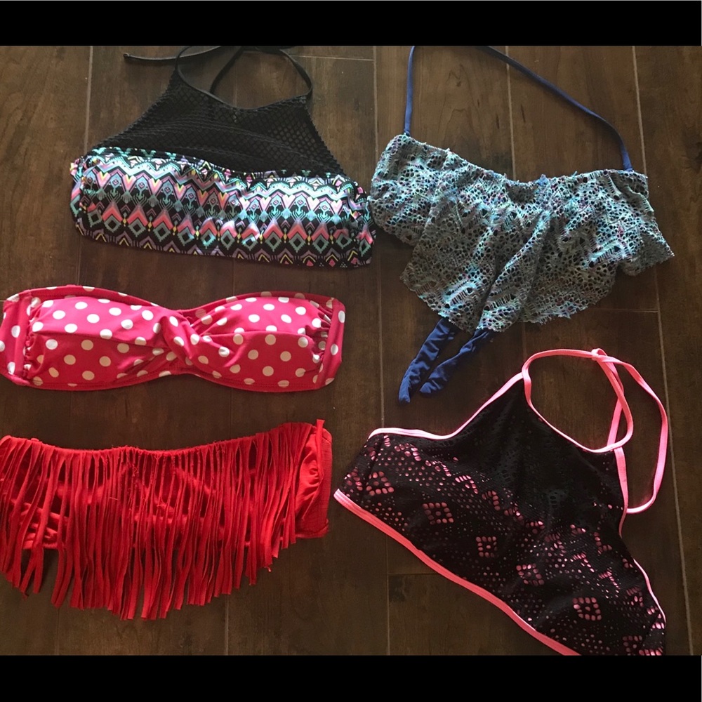 Bathing suit tops. All look good w/black bottoms.